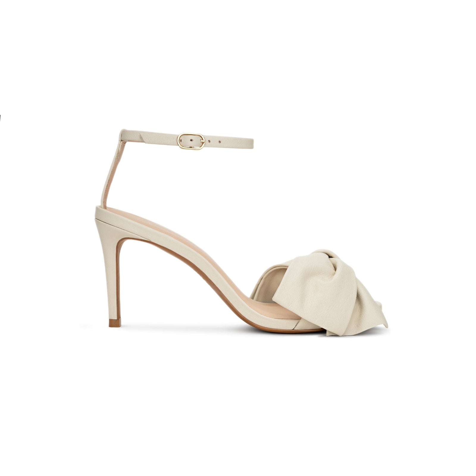 Beige sandal with a bow on a white background